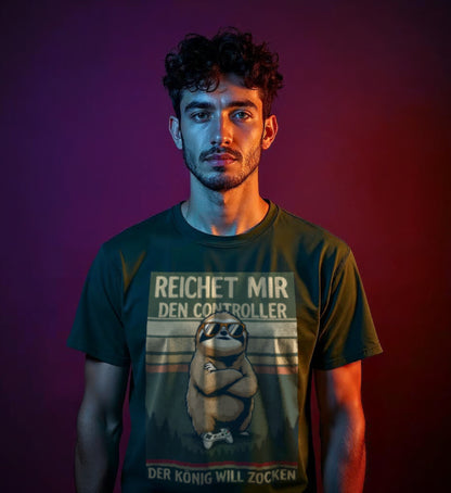 Model man wearing a forest green shirt and a retro gaming design on the front of the shirt